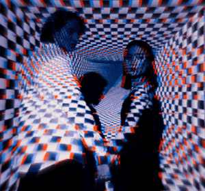 Checkered 3D picture of man and woman.