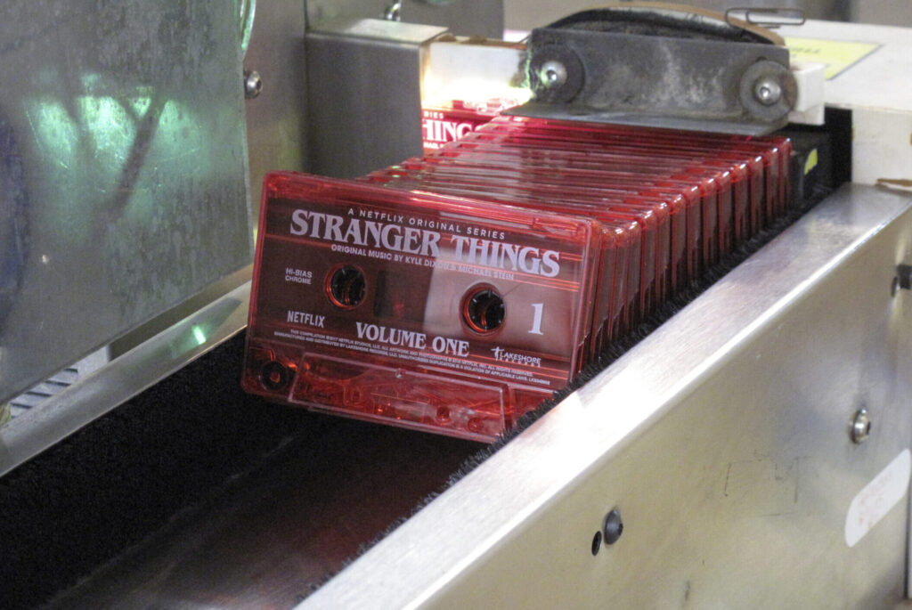 cassette tapes on a conveyor belt