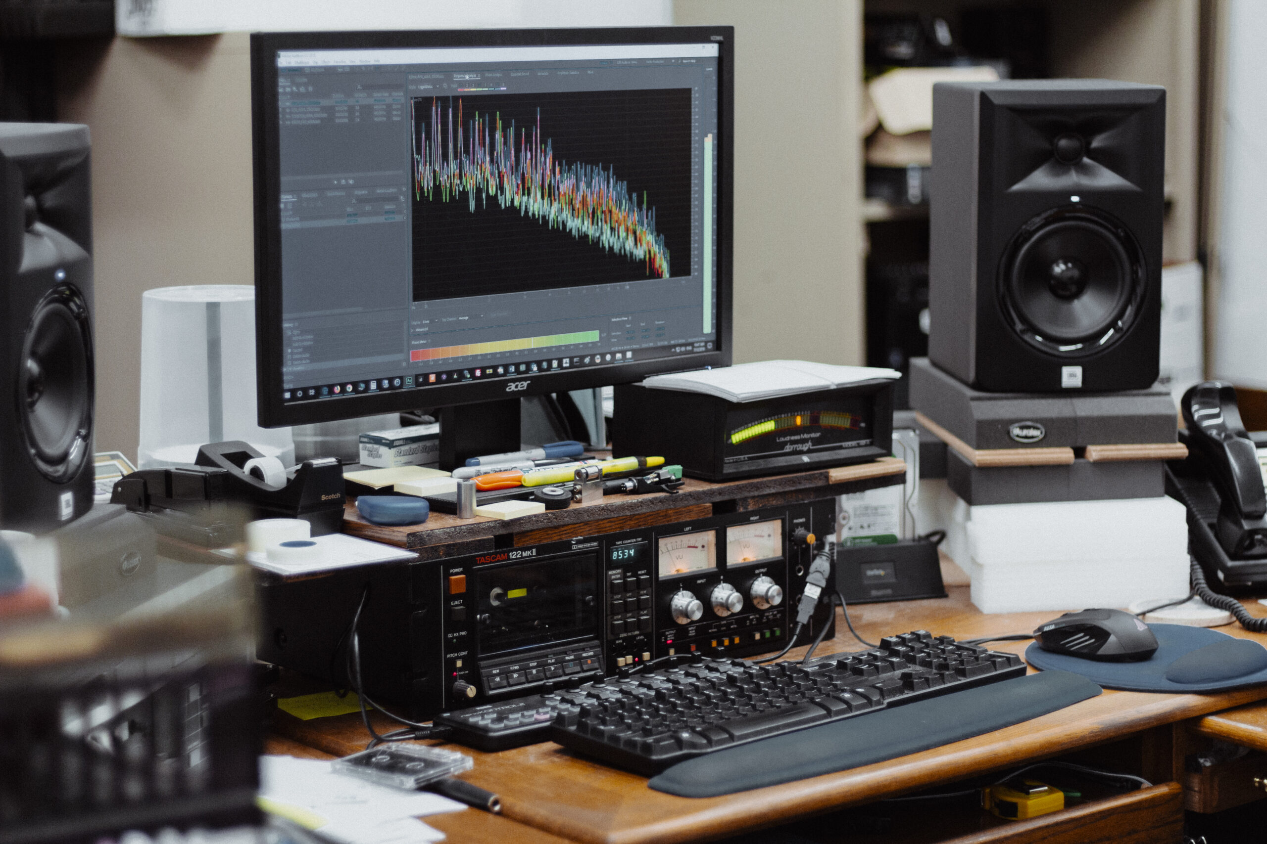 a computer monitor with soundwaves