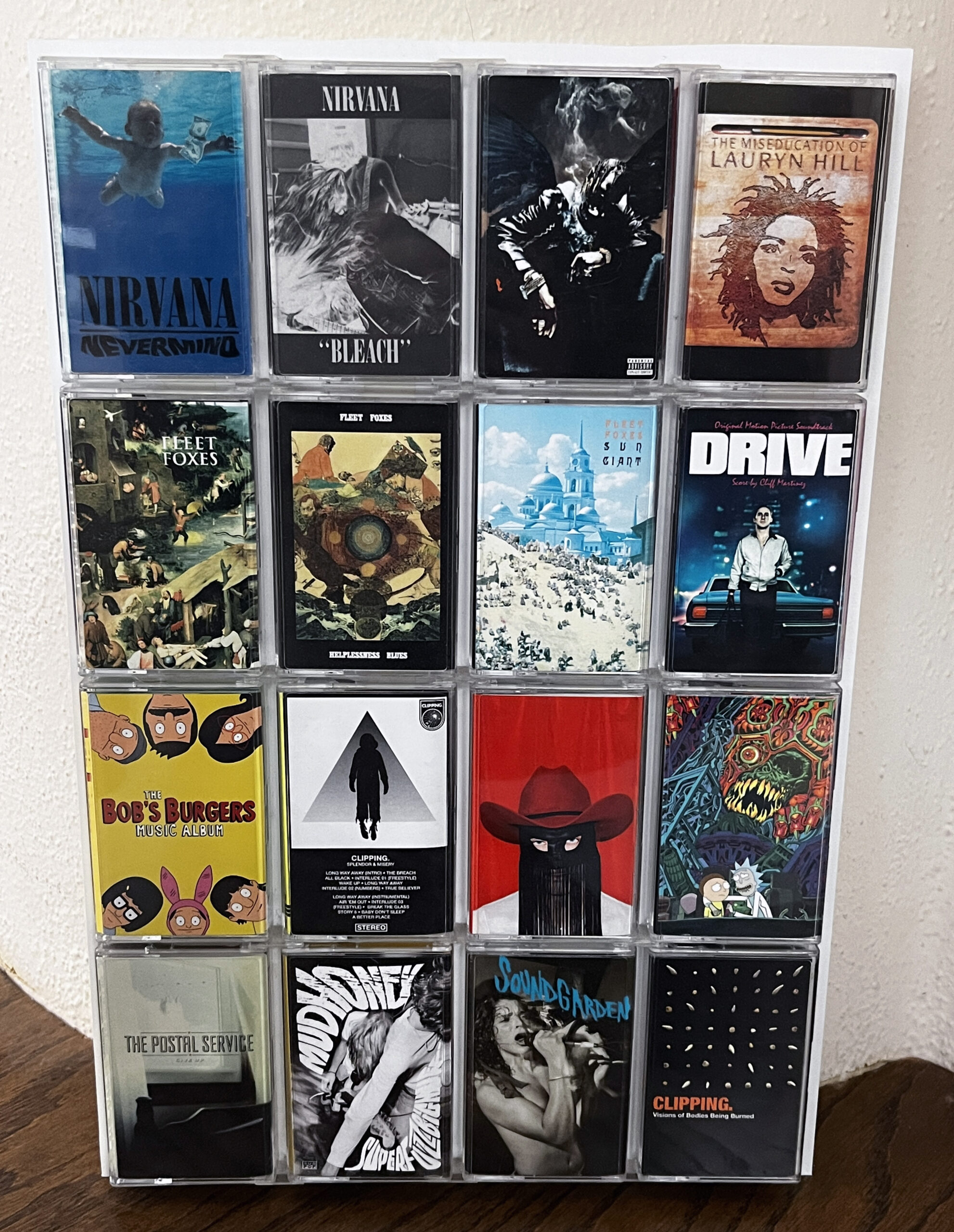 a display of 16 cassette tapes