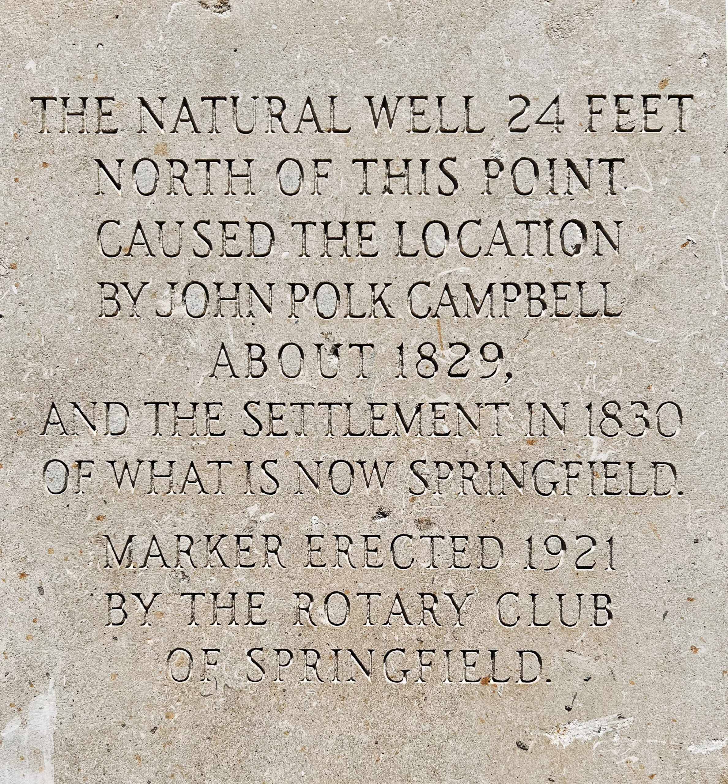 A plaque on the National Audio Company building at 309 E. Water Street reads: "The natural well 24 feet north of this point caused the location by John Polk Campbell about 1829, and the settlement in 1830 of what is now Springfield." 